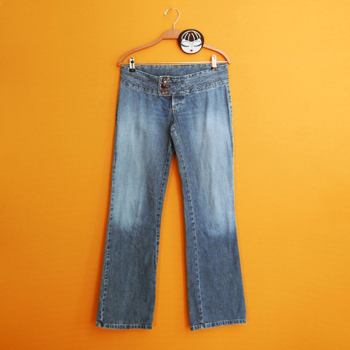 calça flare cintura baixa