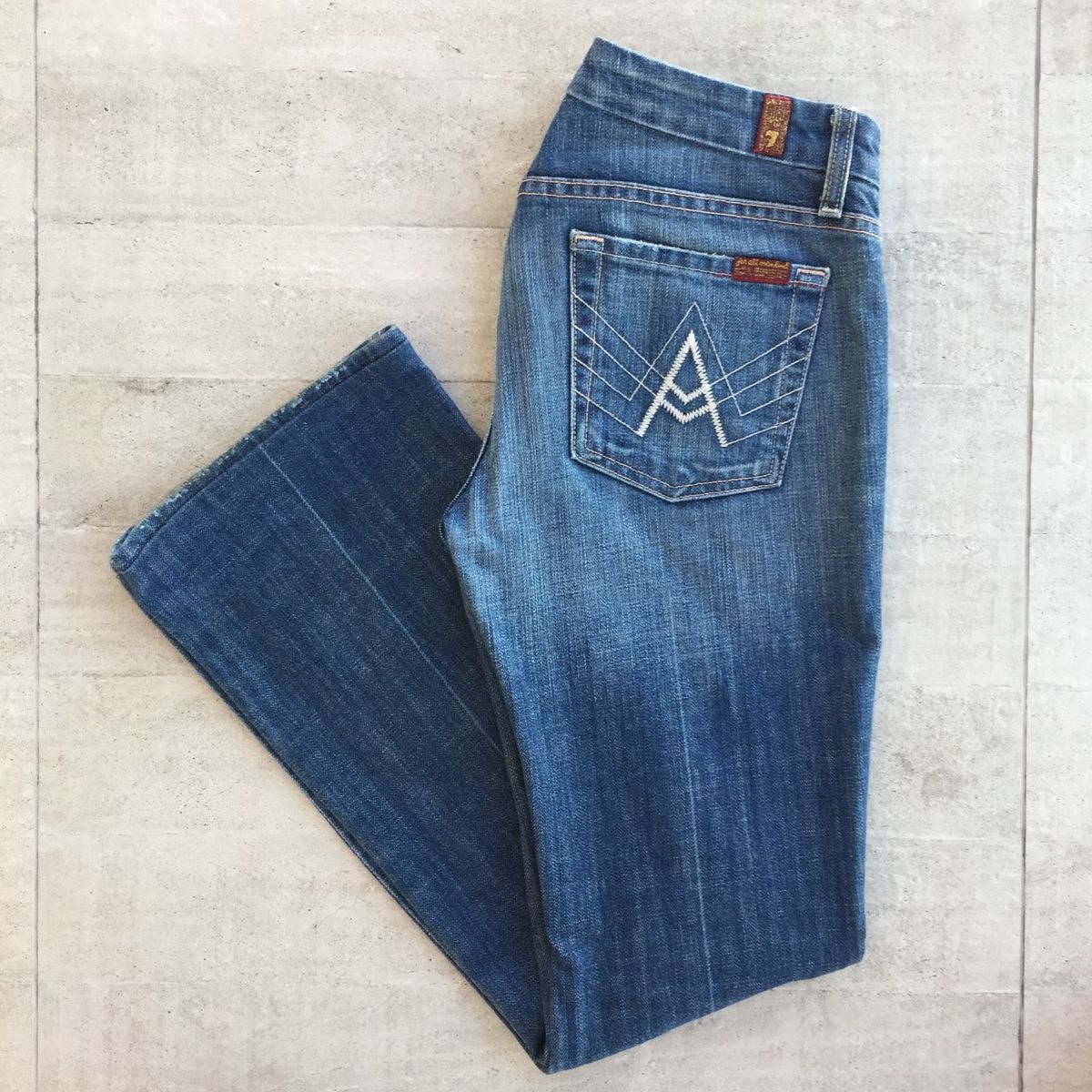 calça jeans 7 for all mankind