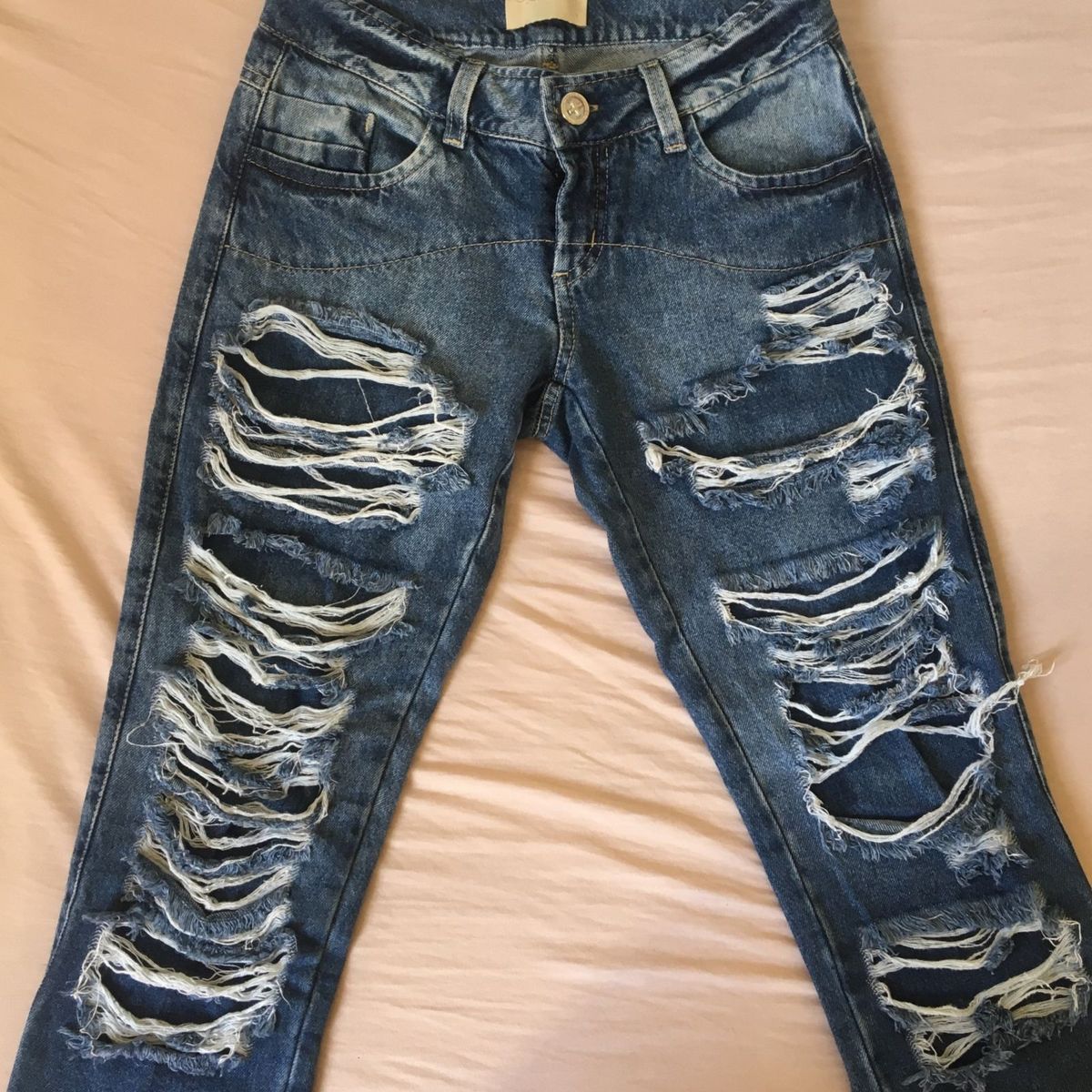 calça jeans infantil rasgada