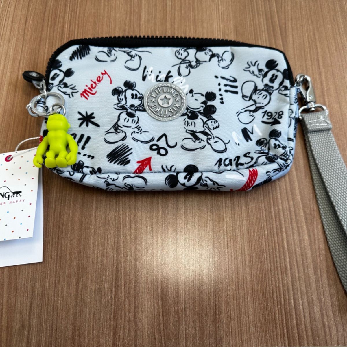 Monedero kipling mickey discount mouse