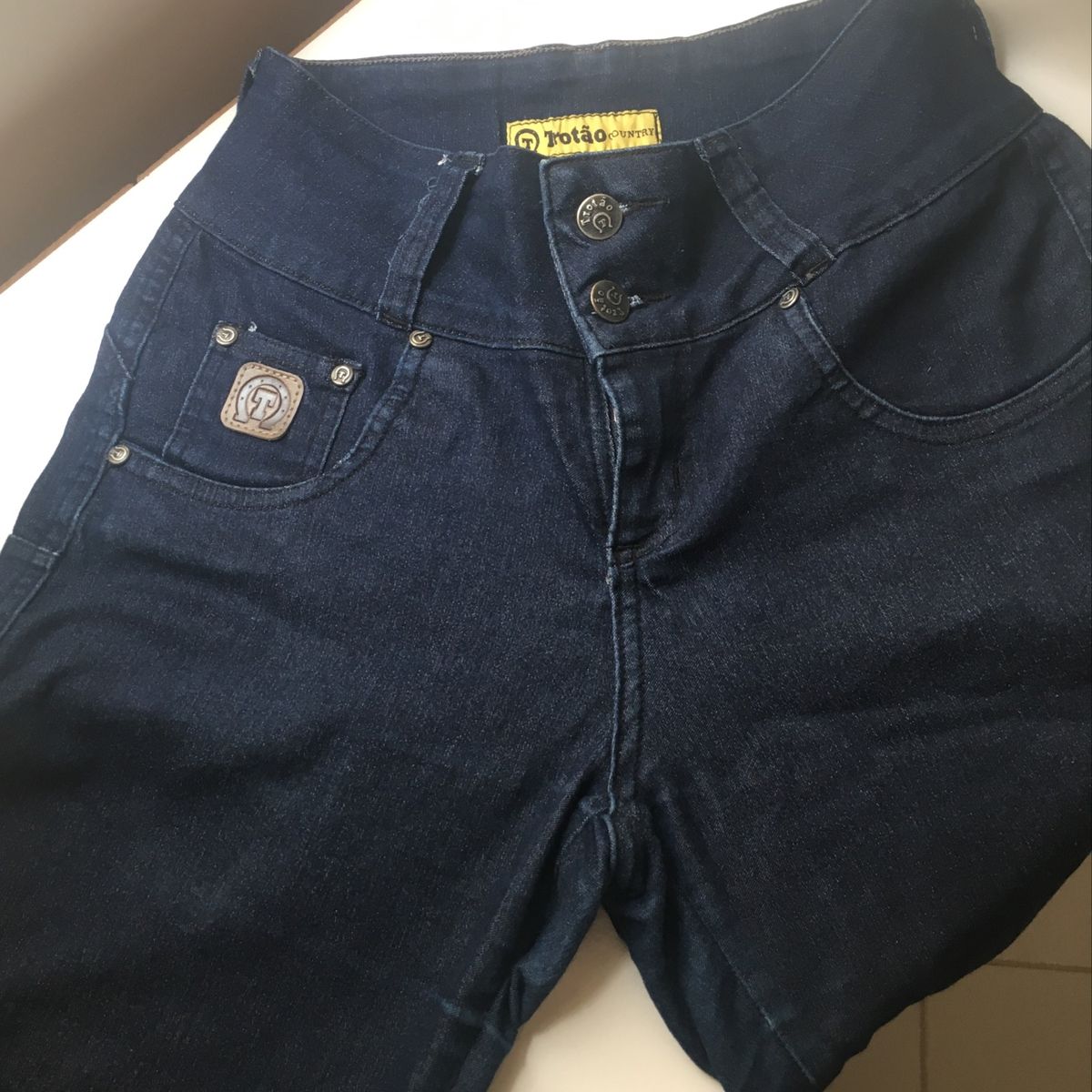 calça jeans trotão feminina