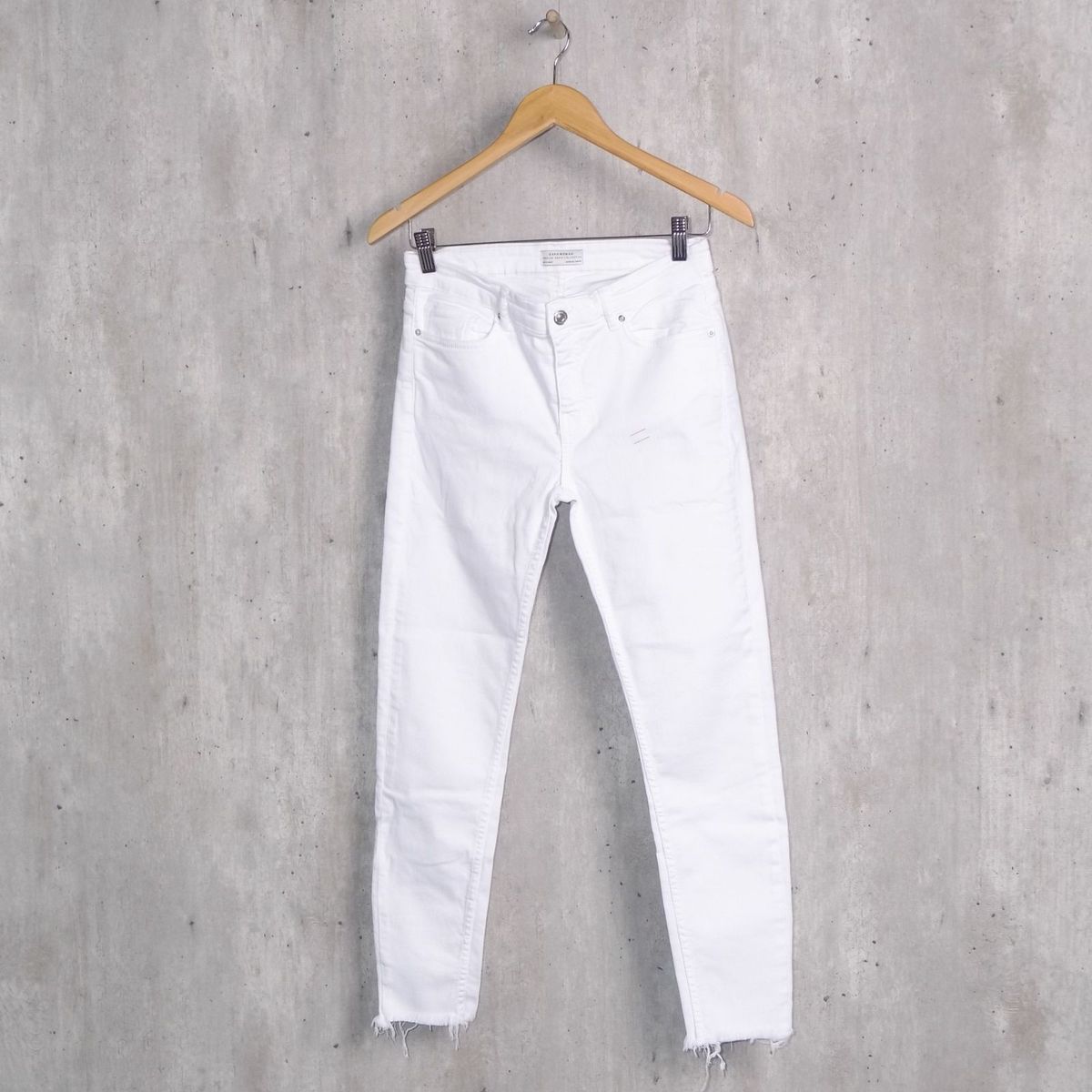 calca jeans branca desfiada