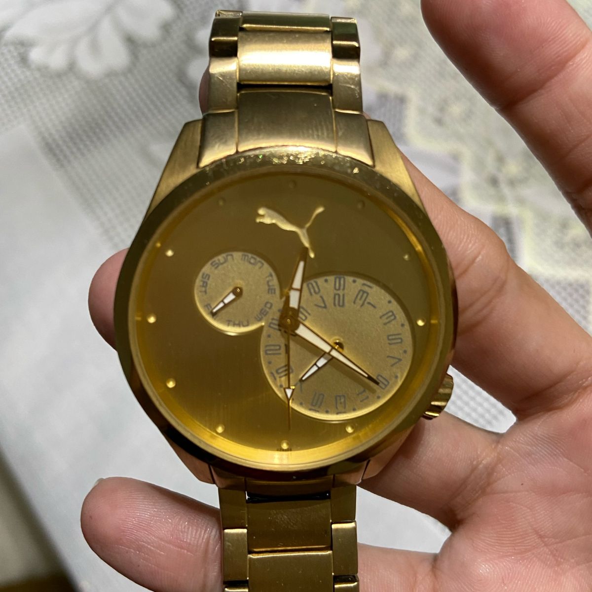 relogio puma dourado feminino