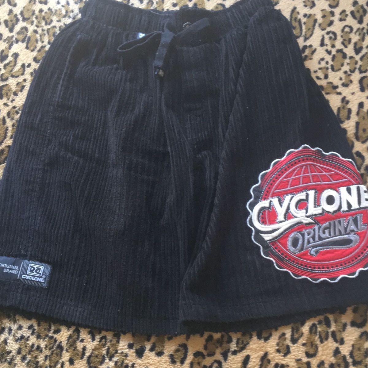 calça cyclone replica