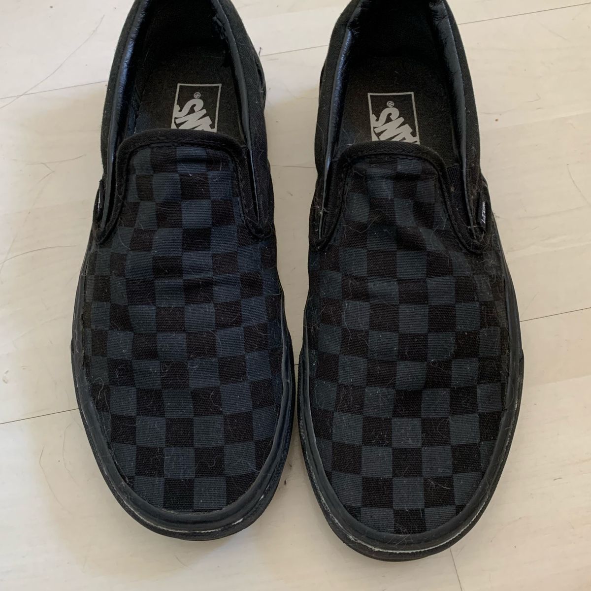 vans slip on quadriculado preto e branco