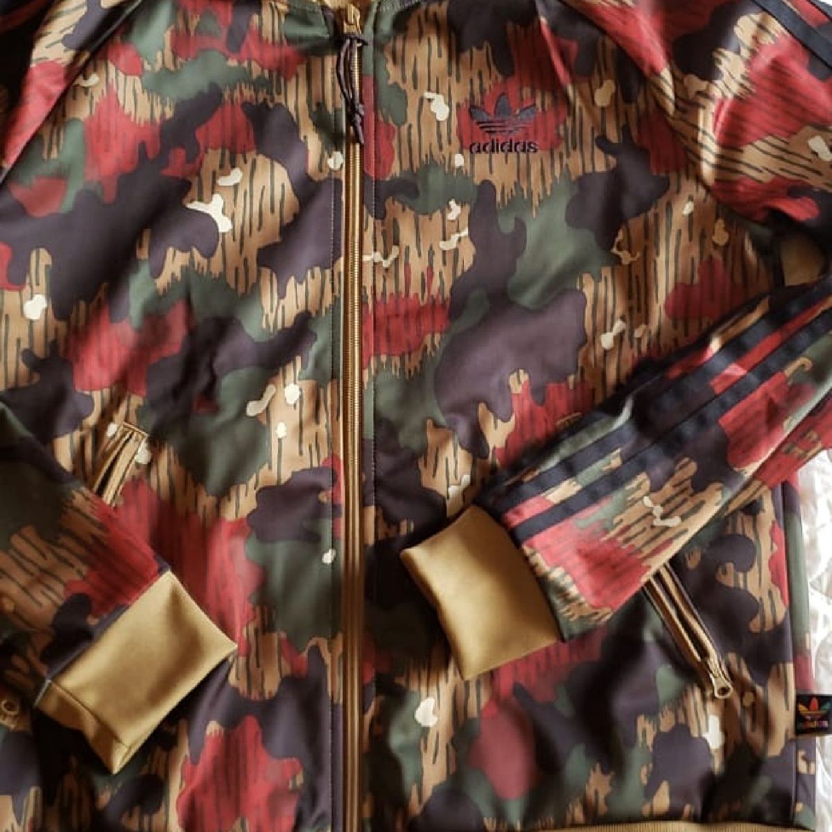 corta vento adidas pharrell williams