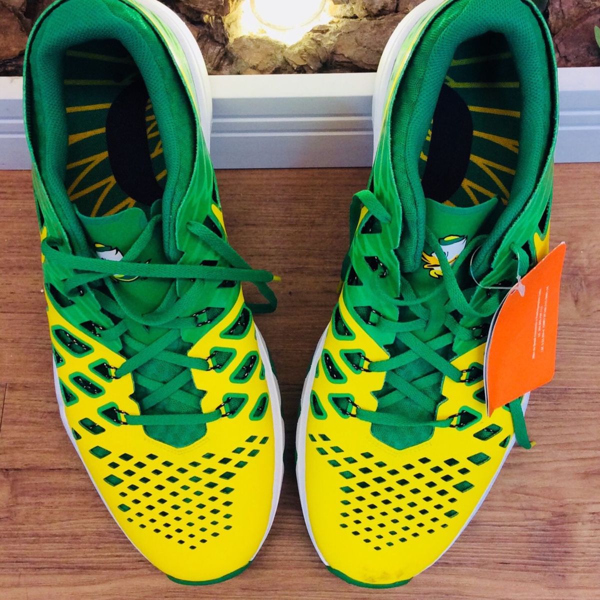 tenis nike verde e amarelo