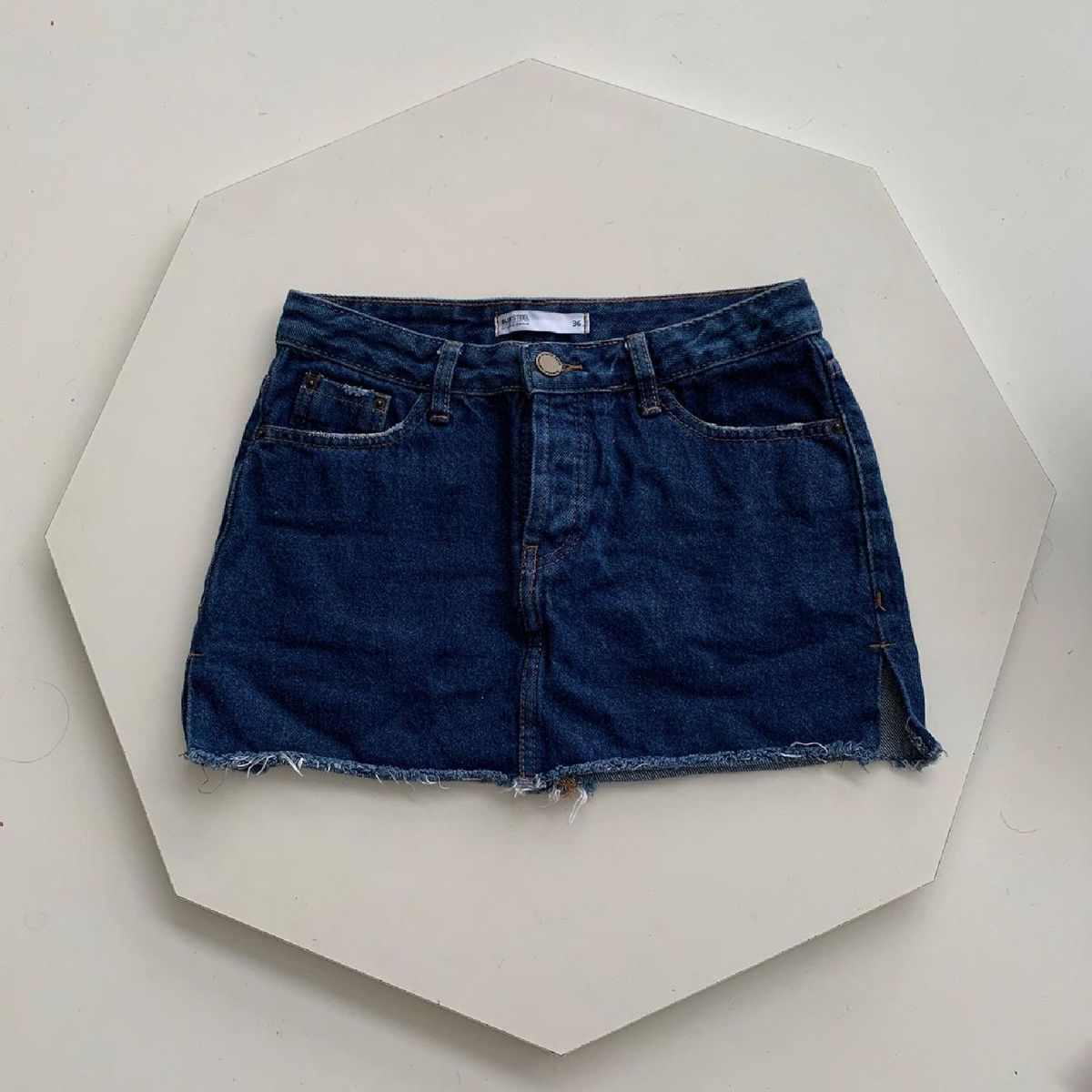 saia jeans curta renner