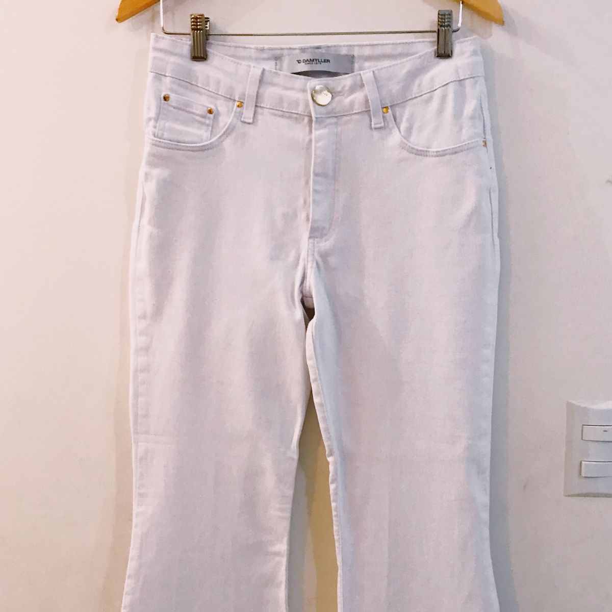 calça flare damyller