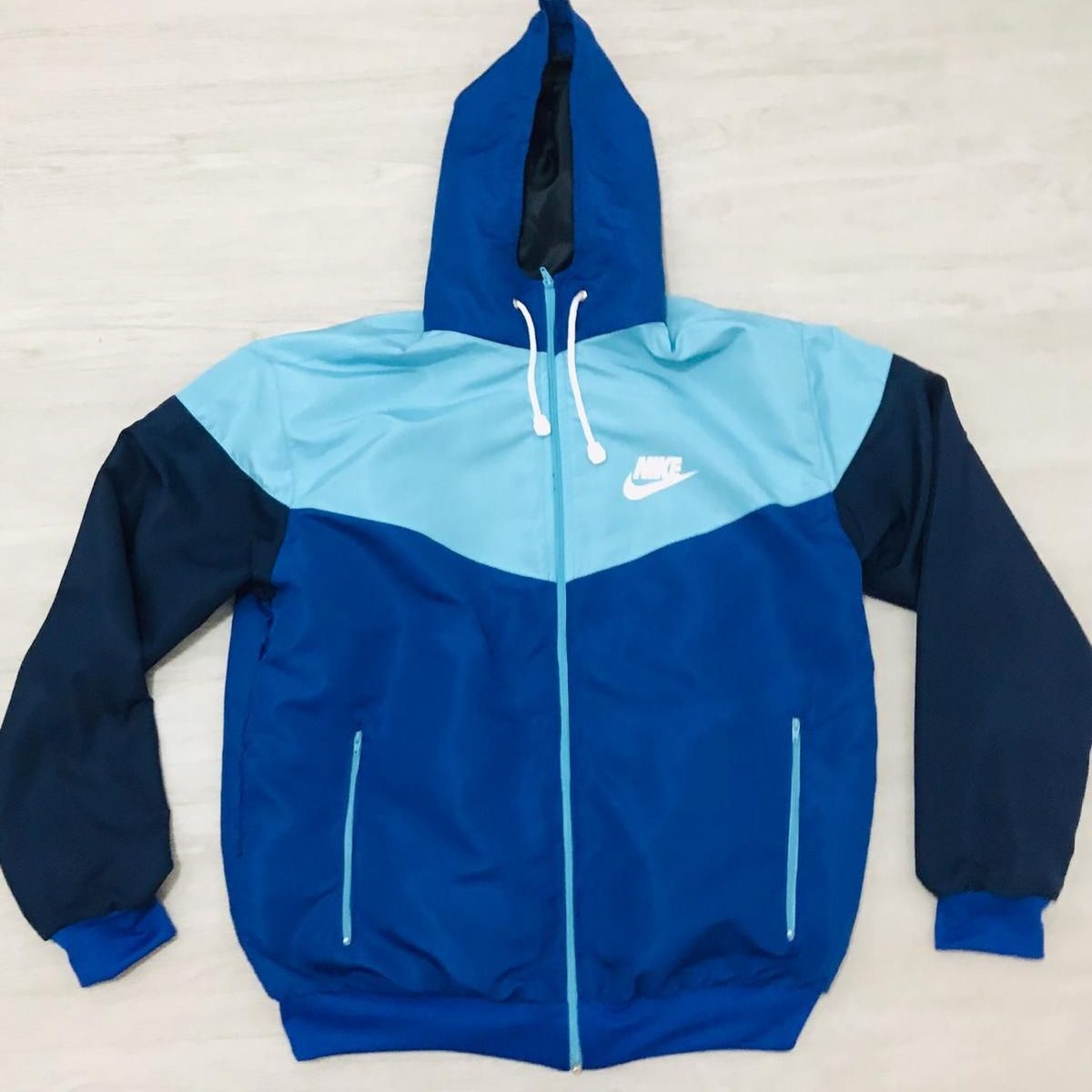 corta vento azul bebe