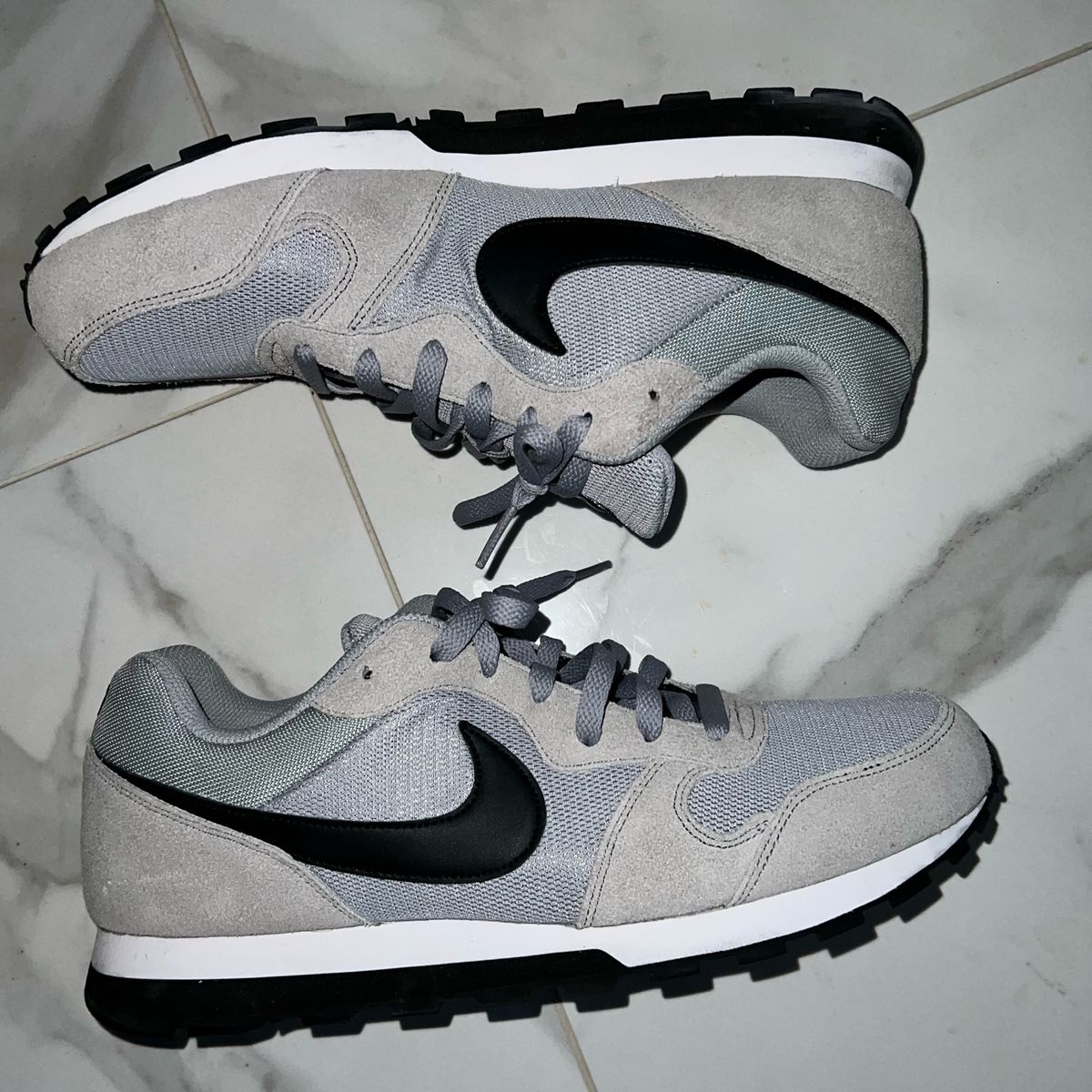 Tenis nike store md runner cinza