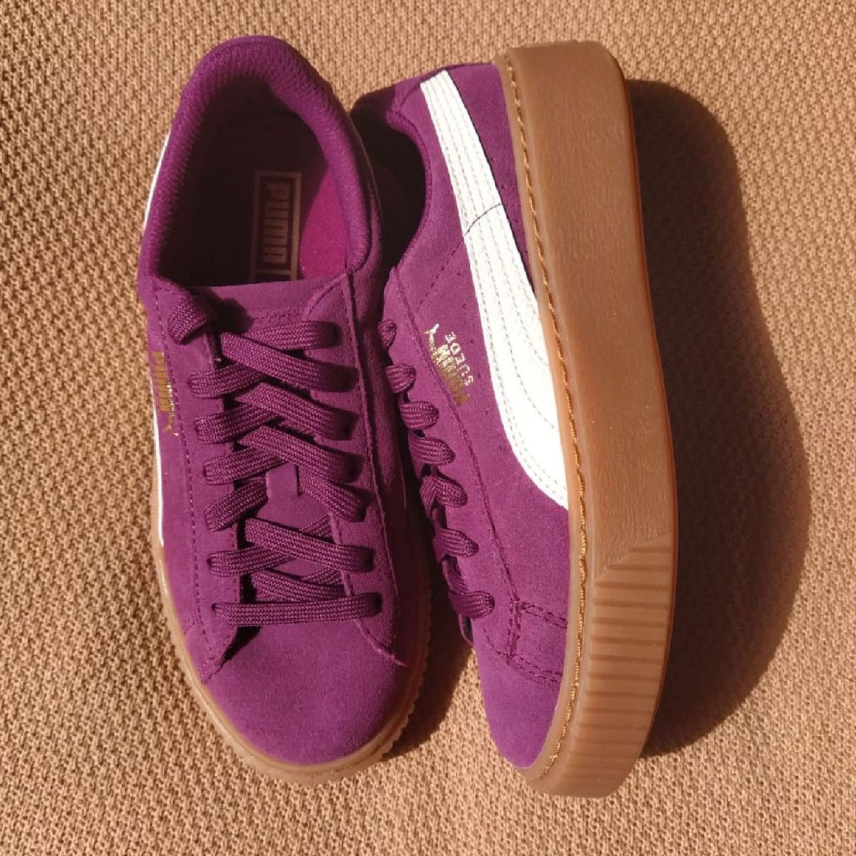 puma sola marrom