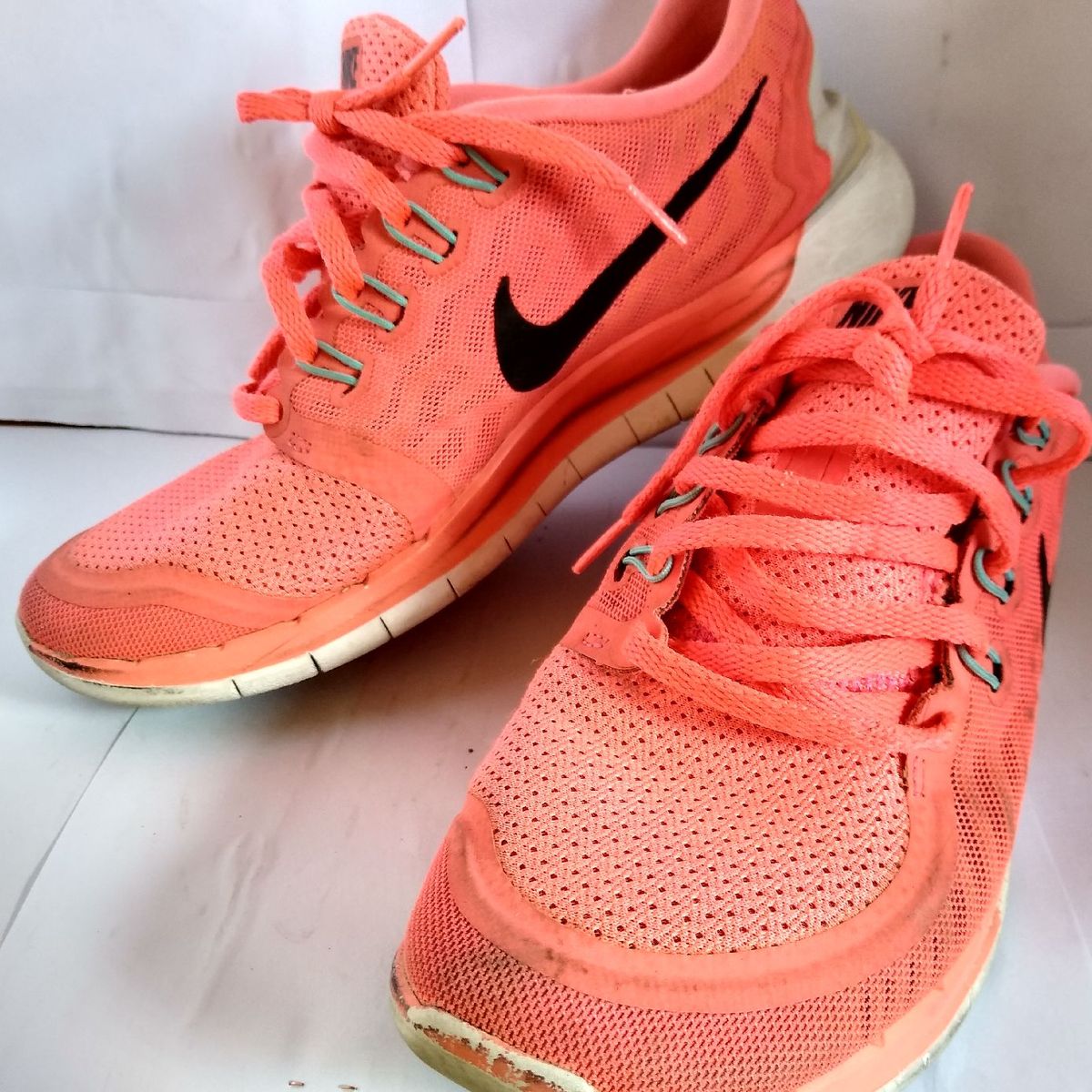 Tenis nike best sale laranja neon