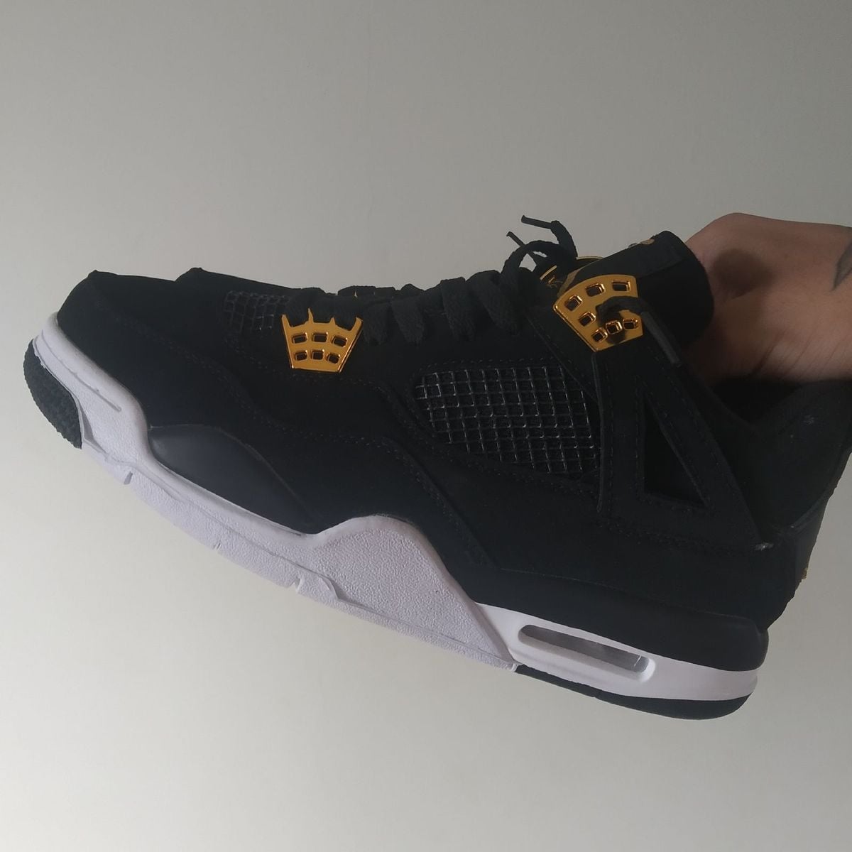 air jordan 4 preto e dourado
