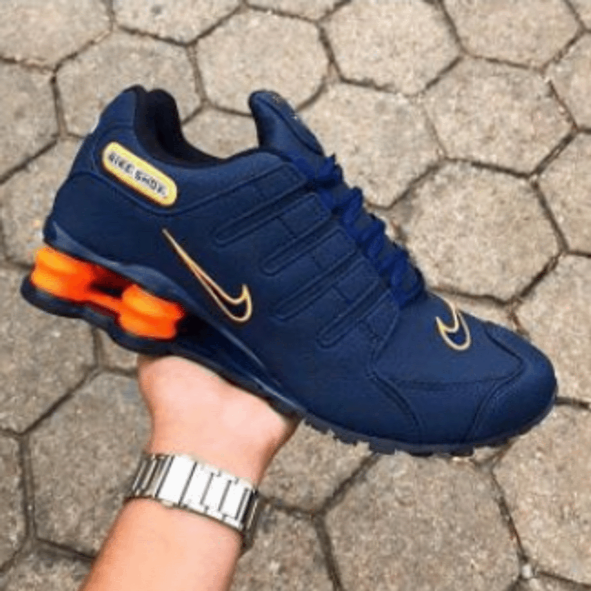 tenis nike azul com laranja