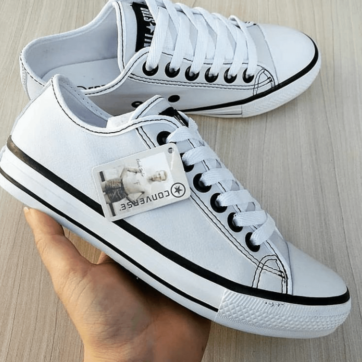 all star de couro branco com costura preta