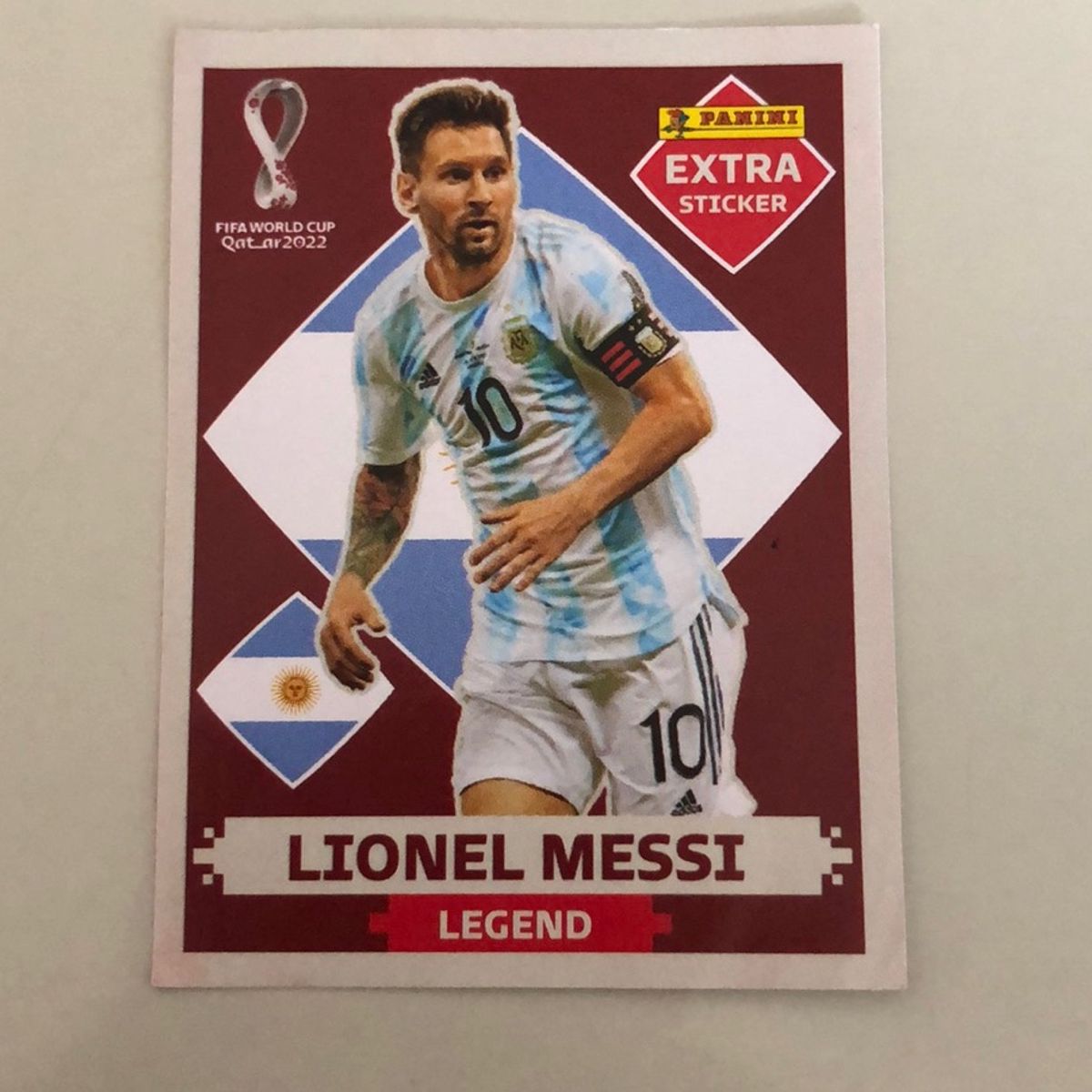 Figurinha Lionel Messi Bordô Copa 2022 Legend - Promoção