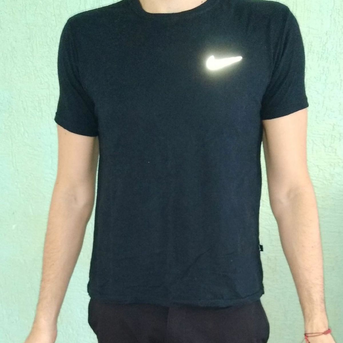 blusa da nike olho de gato