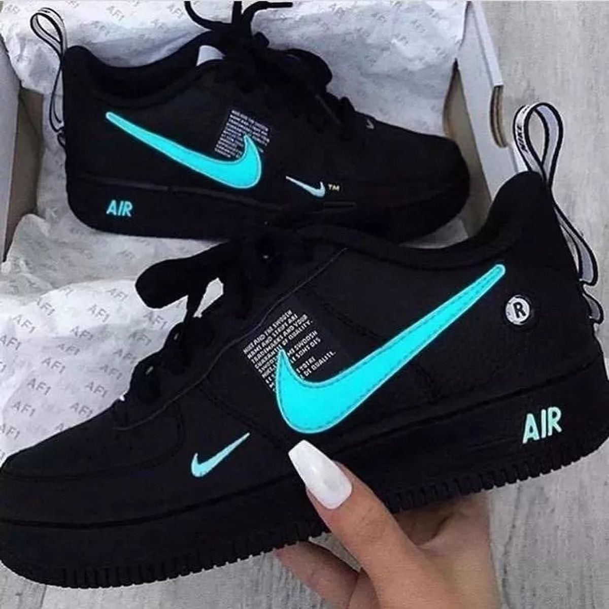 Tênis da nike preto sales e azul