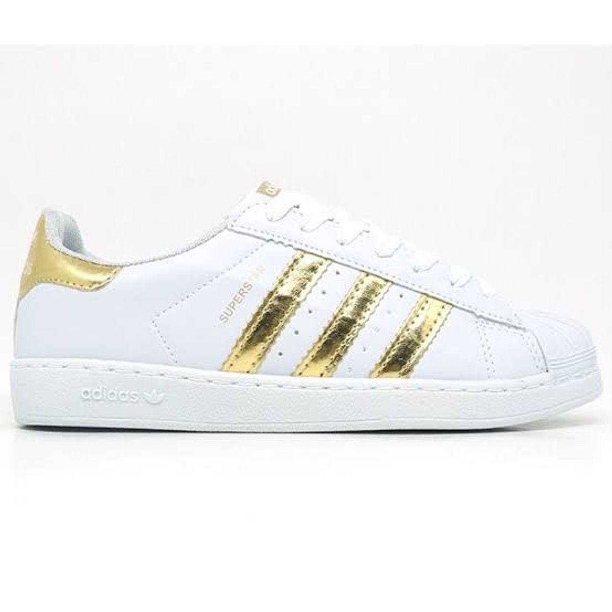 tenis adidas branco com dourado