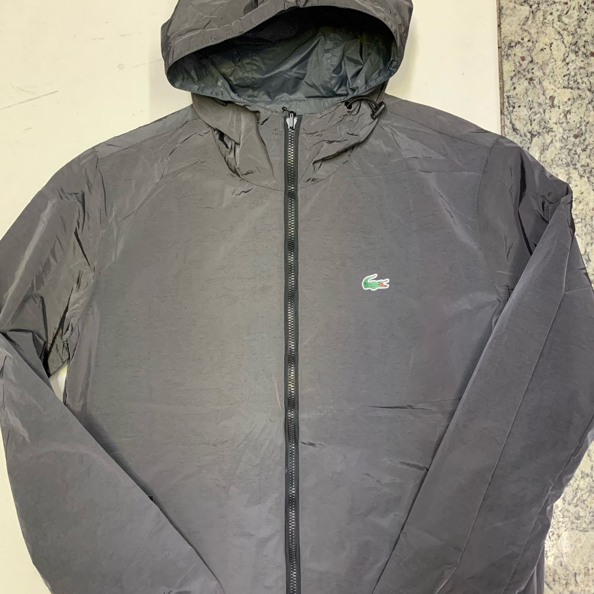 corta vento lacoste dois lados