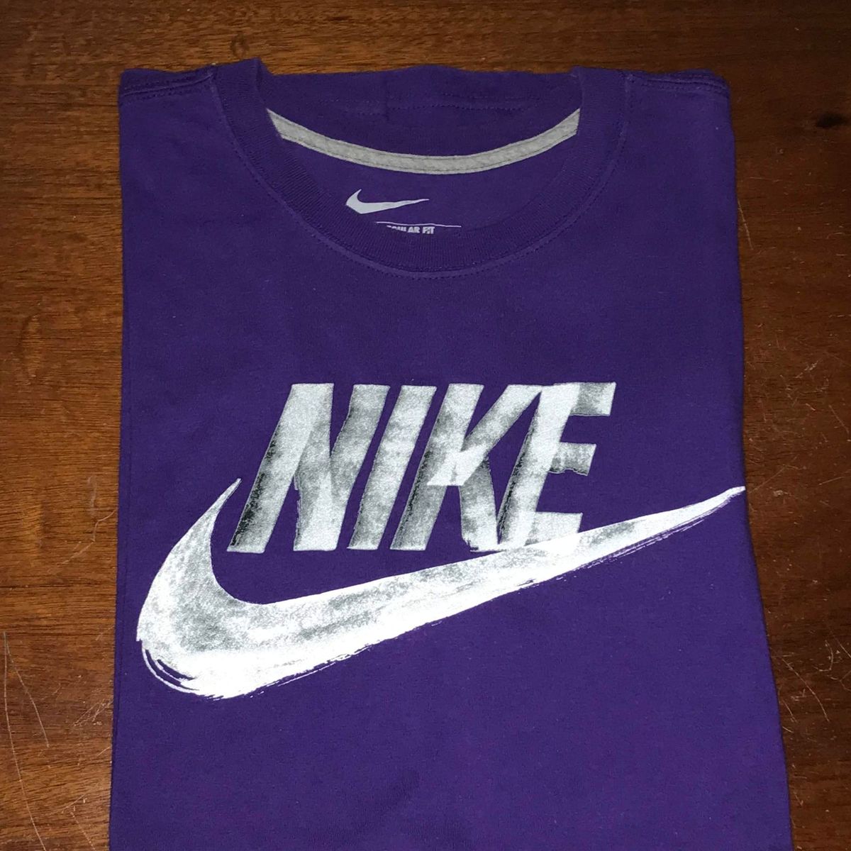 camiseta nike roxa