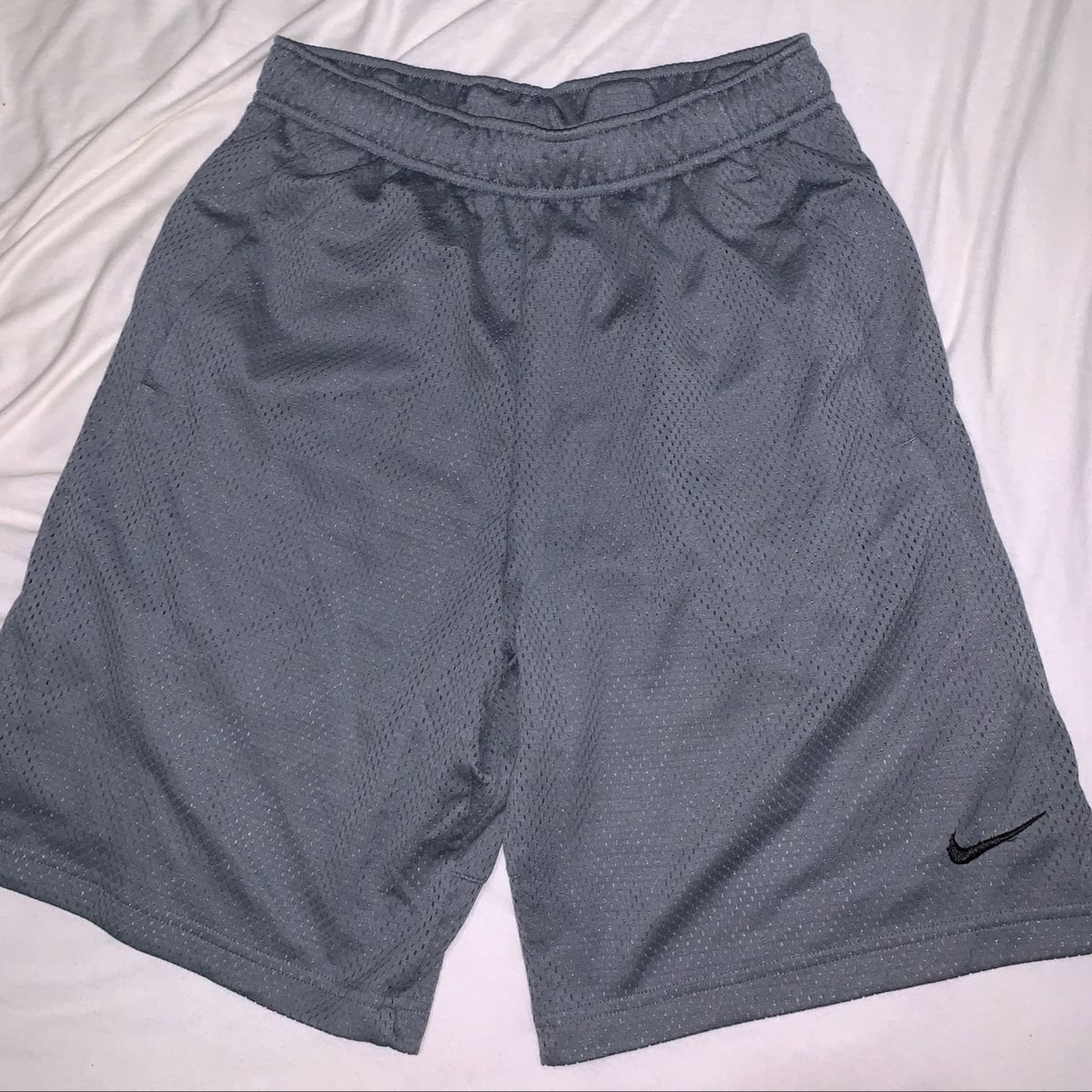 Bermuda store nike tecido