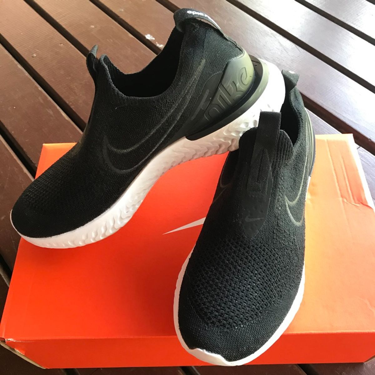 tênis nike epic react flyknit feminino preto