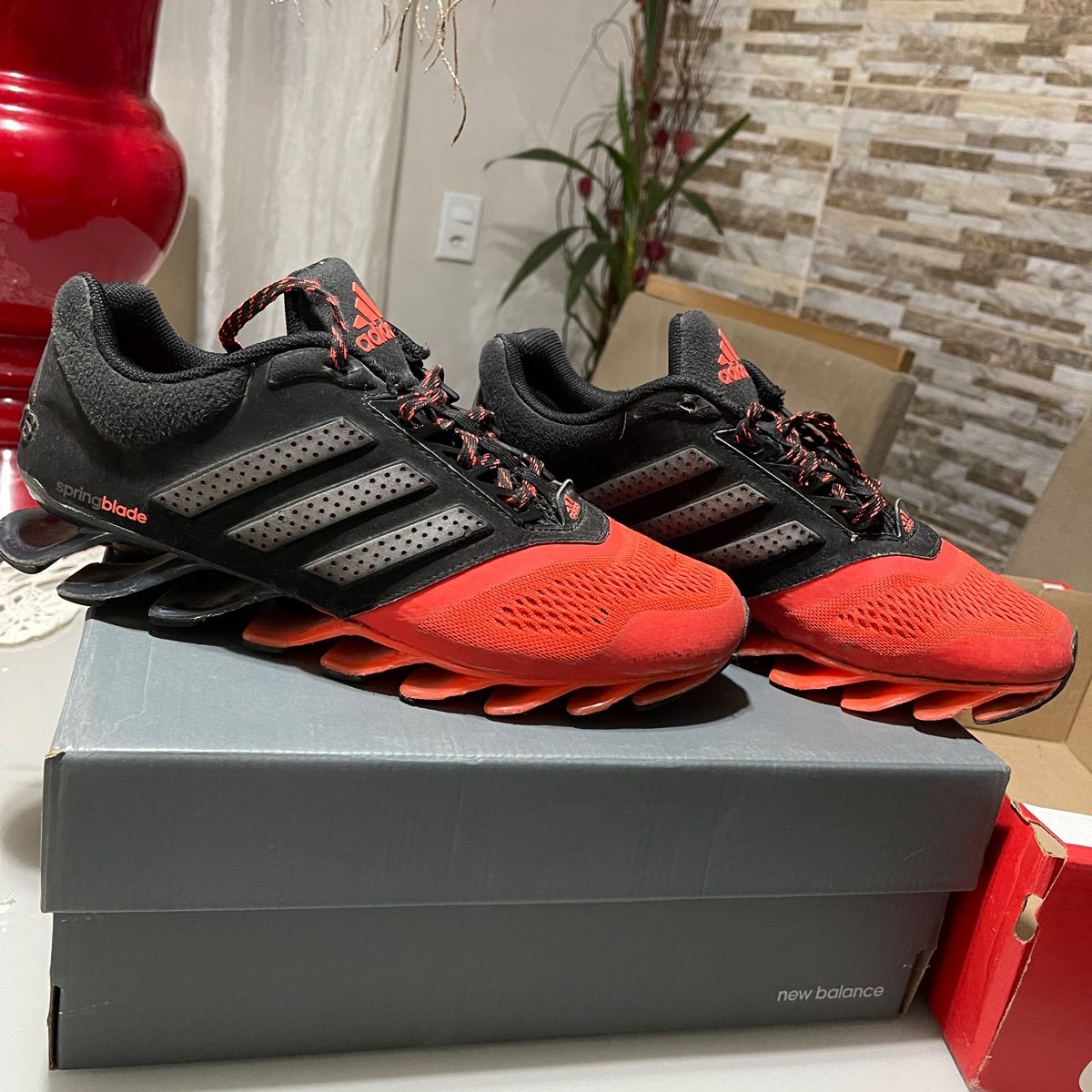 Adidas springblade store vermelho e preto