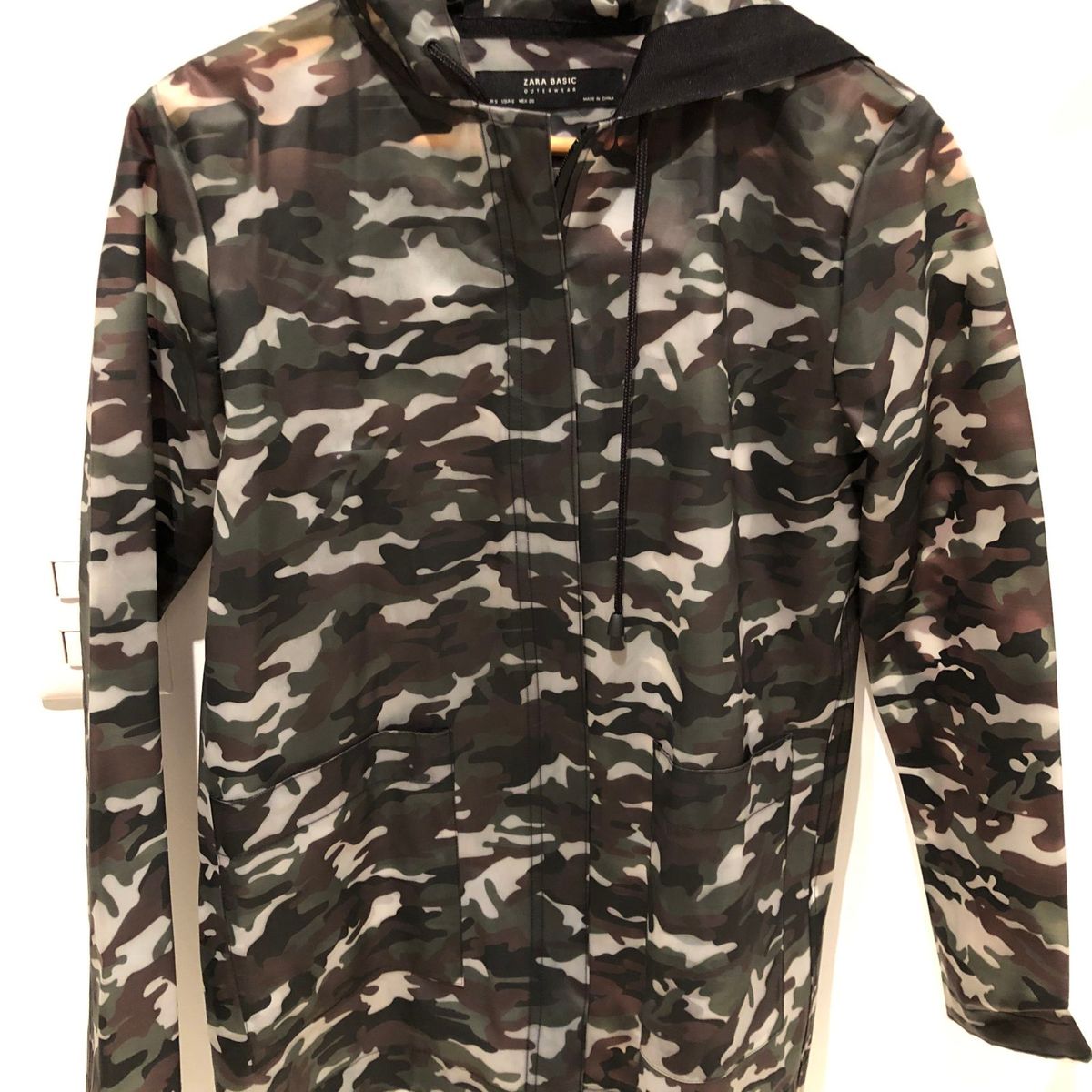 capa de chuva com capuz zara