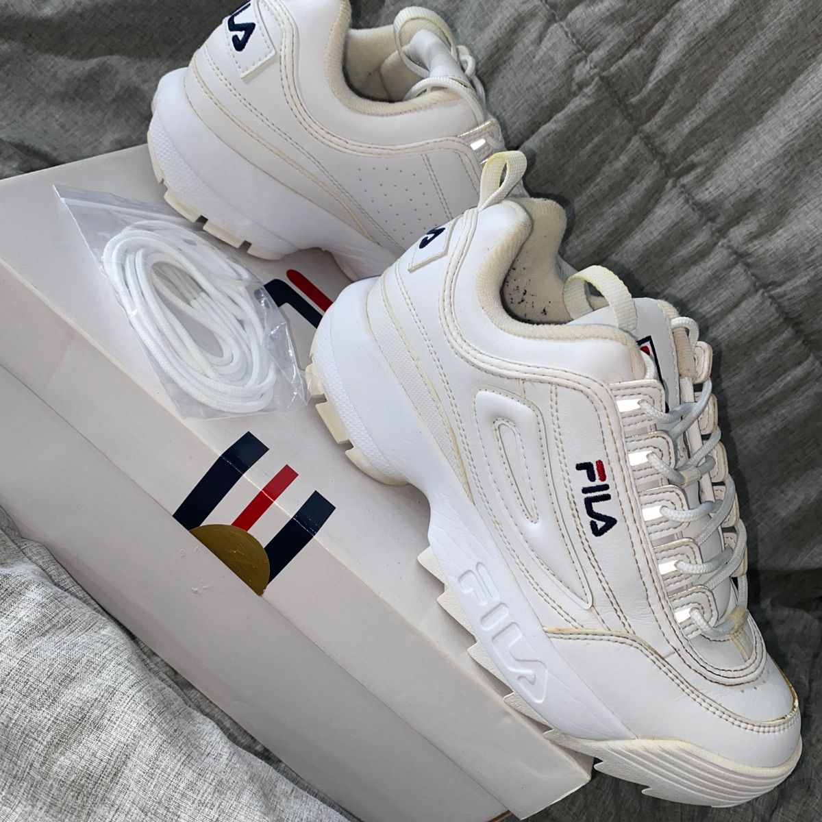 Fila disruptor loja hot sale fisica