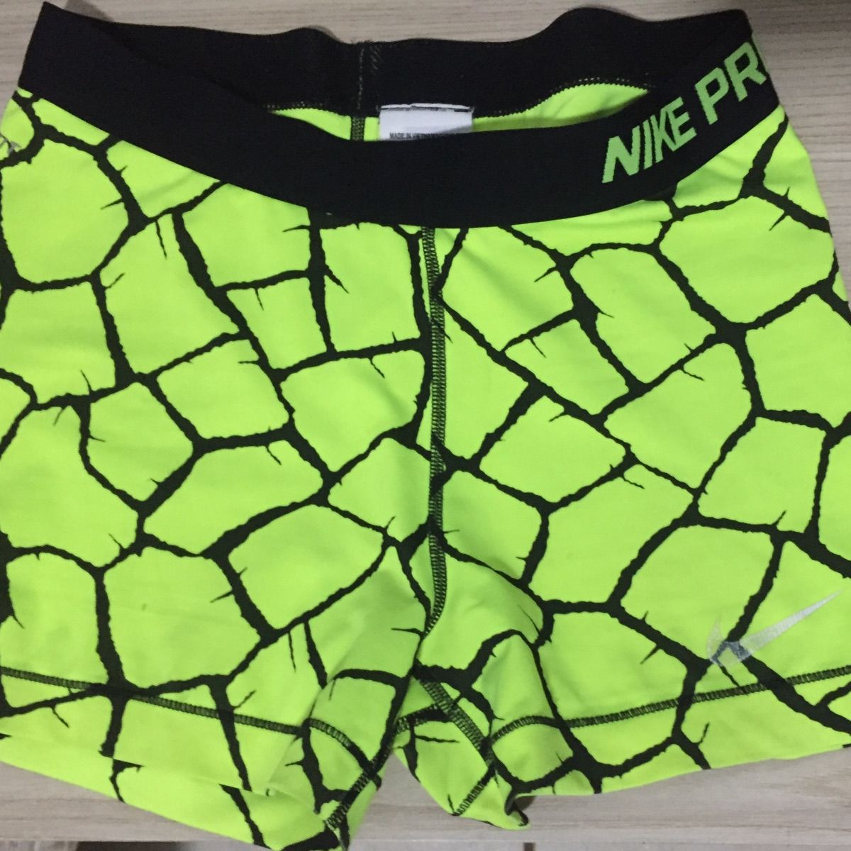 short nike verde fluorescente