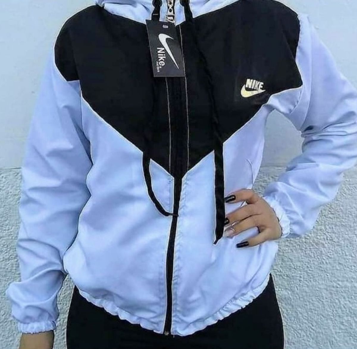 conjunto nike feminino corta vento