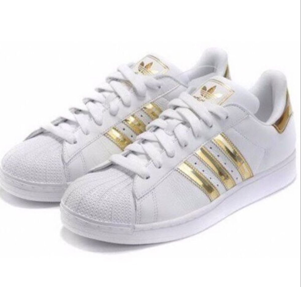 tenis adidas feminino dourado e branco