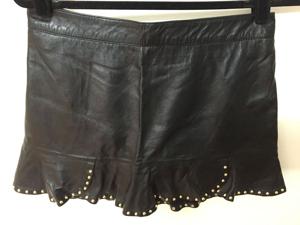 saia preta com tachas