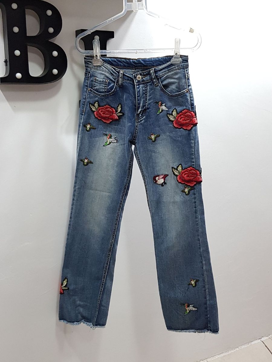 calça jeans bordada feminina