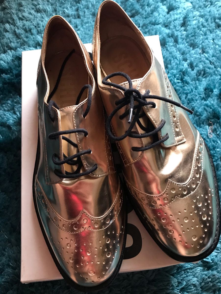 tenis schutz metalizado