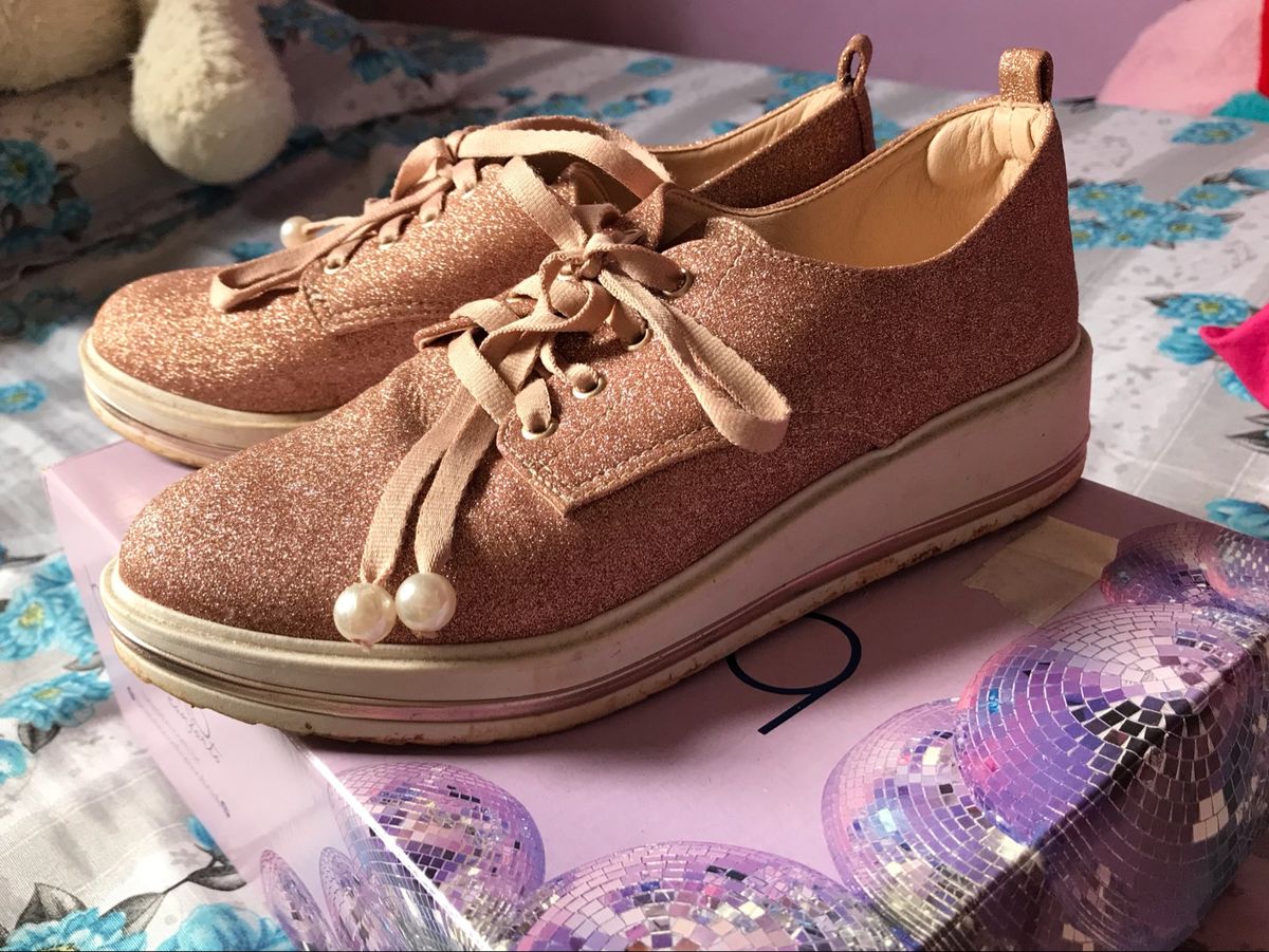 tenis onça riachuelo