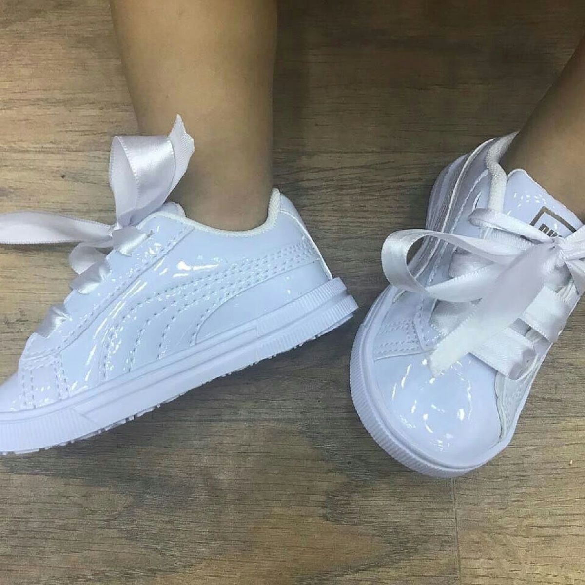 tenis puma feminino rosa com fita