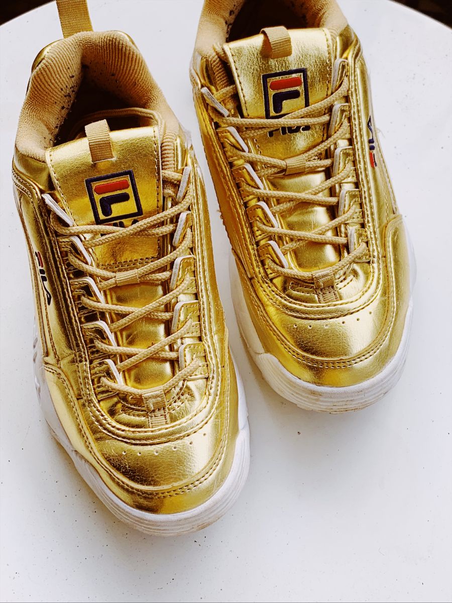 tenis fila disruptor dourado