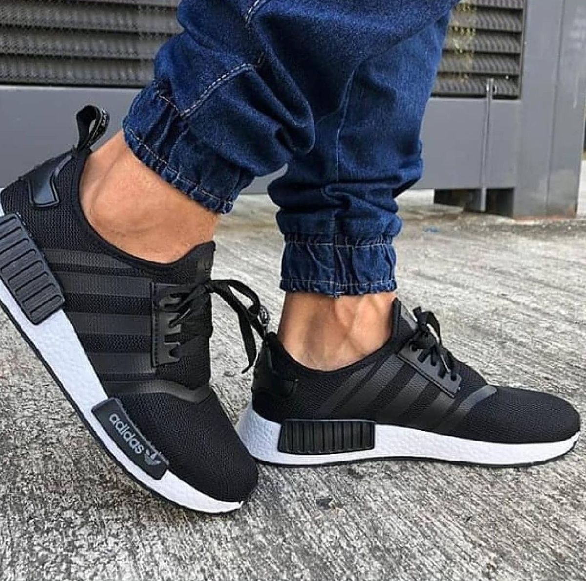 nmd preto vermelho e azul