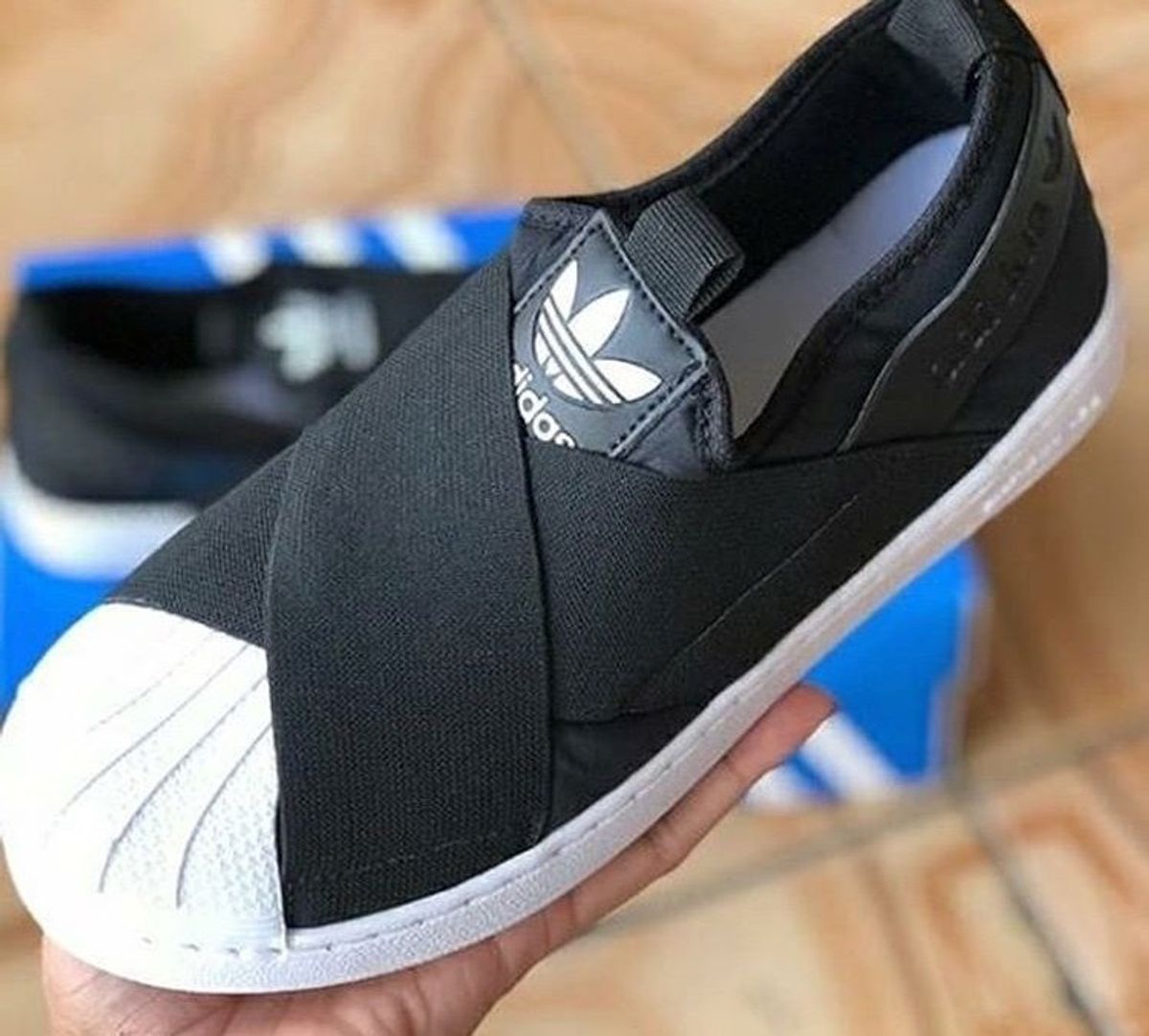 tenis adidas preto e branco com elastico