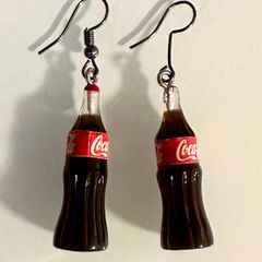 Brinco de Coca Cola - Escorrega o Preço