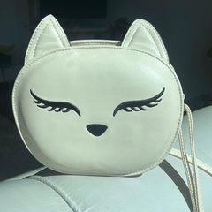 Imaginarium - Tem mochila de gato (peludinha, com orelha e