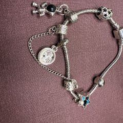 pulseira com berloques astronauta estrela coração