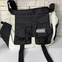 mochila branca e preta transversal tipo pasta