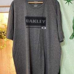 OAKLEY Camiseta masculina cinza mescla estampa preta caveira G - Second  Hand / Brecho