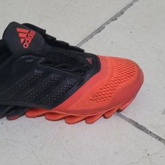 Adidas springblade preto e best sale laranja original