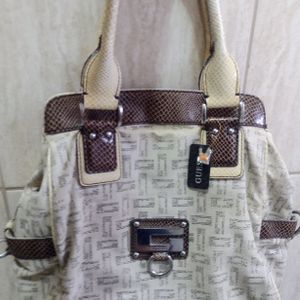 bolsa original grande cor palha 137668038?action_source=71545&ref=home_home&rsp=1&rspix=1