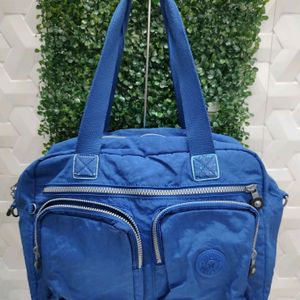 bolsa original kipling azul bic grande com varios bolsos alca mao longa maternidade esporte treino 151084006?action_source=76035&ref=home_home&rsp=1&rspix=1
